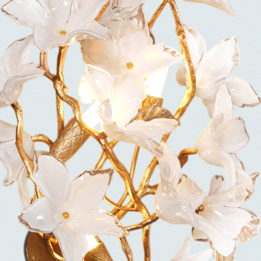 Artistic Floral Wall Sconce with White Glass Flowers